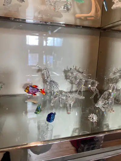 Multiple Swarovski Crystal pieces. All items are in perfect condition, no chips or scratches. Comes...