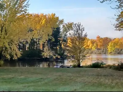 MOVE IN READY This charming apartment features a beautiful river view, perfect for tranquil living....