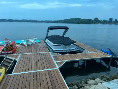 Very low hours. Stored inside covered on new Phoenix trailer. Has signature package. Docking lights....