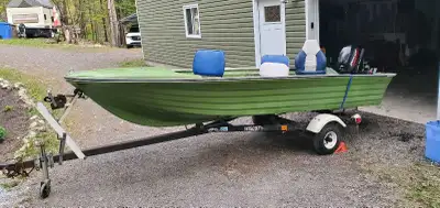 14' Doral fiberglass boat, 455 lb hard chined hull, good condition and handles waves well. 2007 9.9...