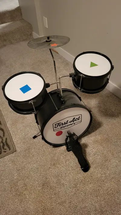 Kids starter drum set. Brand-First Act Discovery. Includes bass drum with foot pedal, snare drum, to...