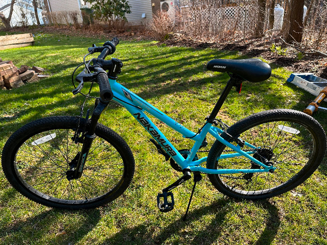 24” Mountain bike with front fork suspension and handle shift in Mountain in City of Halifax