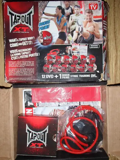 Tapout XT Workout Dvd Set for sale New in open box 12+1 workout dvds, comes with resistance + leg tr...