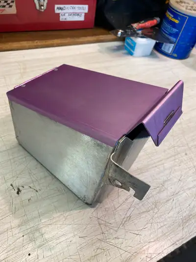 This box is designed to be a tour storage box under the hood for an older arctic cat snowmobile but...