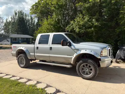 2005 Ford F350 Lariat 6.0L Powerstroke Bullet Proofed. Studded and deleted Starts/runs amazing 0 smo...