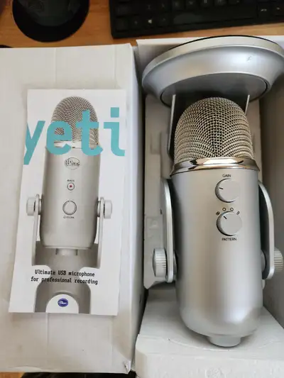 Still in box, never used. It does have a small scratch on its base. Read all about the mic, and see...