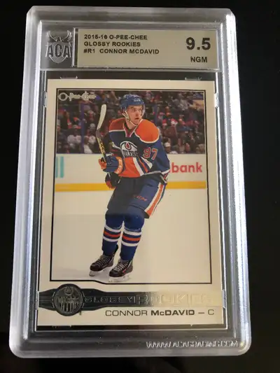 Connor Mcdavid OPC glossy rookie card graded mint 9.5 condition, View more