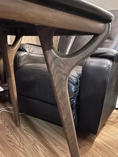 Table with unique wooden legs Top is laminate? No chairs Best offer - want gone Garson
