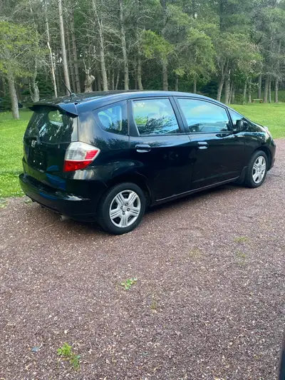 2012 Honda Fit - 5 speed. Reliable car, fuel-efficient with valid MVI until Jan 2027. Great little c...
