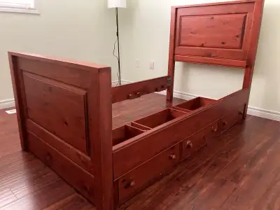 Solid wood bed frame and Sealy twin mattress, View more