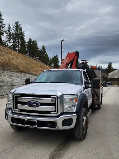 8' Brutus Deck with F65 Fassi Crane. Service deck has locking tool boxes with in-cabinet lighting, l...