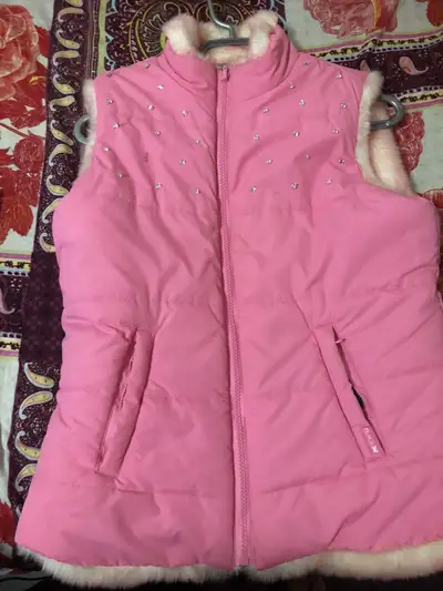 Reversible pink winter vest for girls aged 8-12, View more