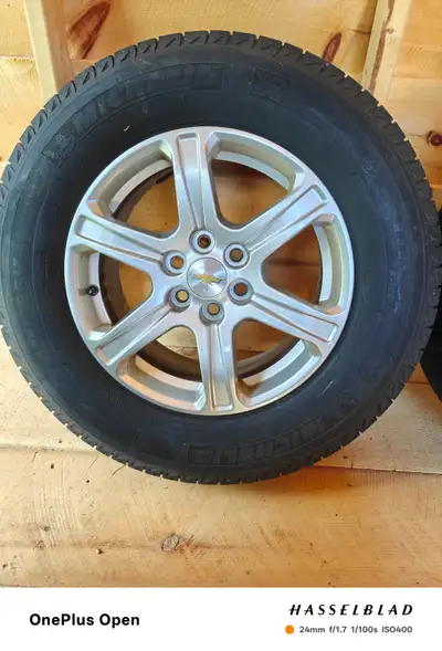 Set of 4 Michelin latitude X-ICE winter tires and aluminum wheels. 245/70/R17 6 x 120 bolt pattern C...