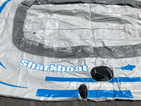 inflatable boat and child and youth life jackets /beach umbrella
