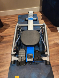 STAMINA® 1215 ORBITAL ROWER WITH FREE MOTION ARMS
