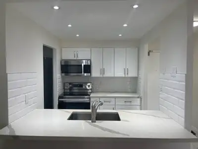 SQ1 Area: 2 Bed + Open Den + 2 Full Bath; all utilities included