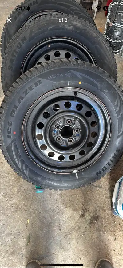 Four steel rims with black hub caps. 17 inch. 5 bolt pattern. Tired not included. $400 obo