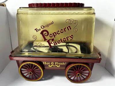 Enjoy a nostalgic treat with The Original Popcorn Factory Hot & Fresh popcorn maker! This charming,...