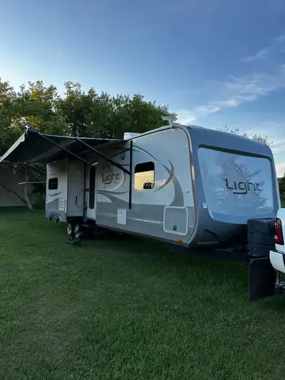 I'm selling my 2015 Open Range 308BHS, a spacious travel trailer perfect for family adventures! This...