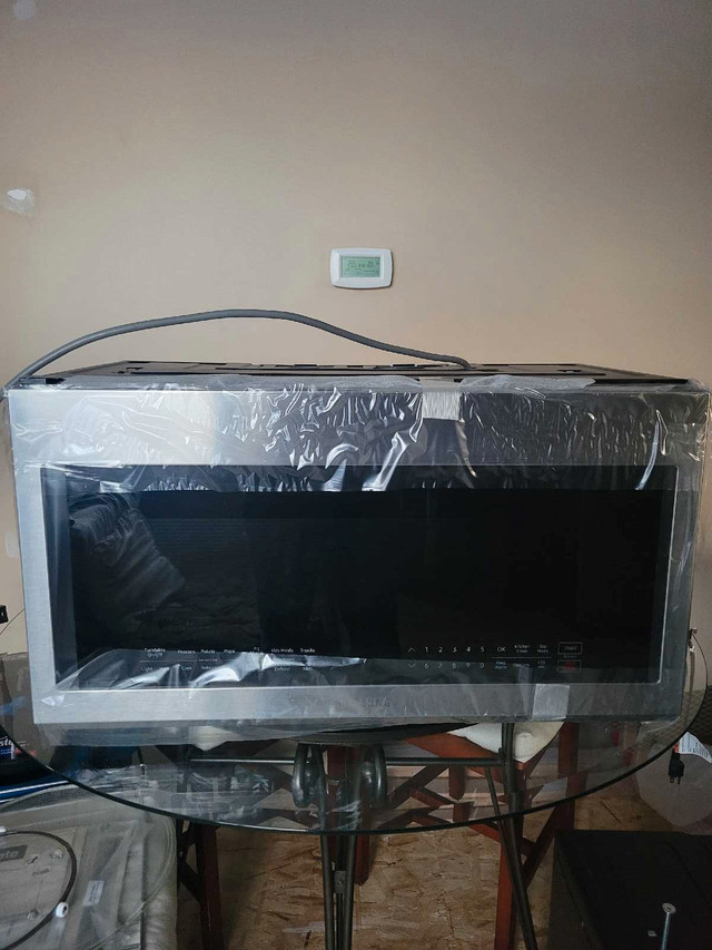 over the range microwave brand new in Microwaves & Cookers in Strathcona County
