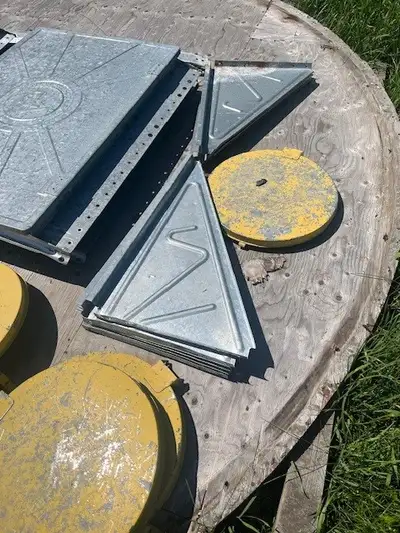 Westeel Rosco grain bin parts. Added hoppers to grain bins. Saved the doors and pieces. Have 7 compl...