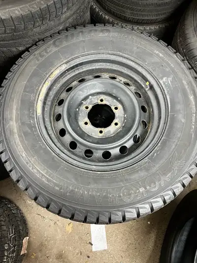 4 YOKOHAMA ICEGUARD WINTERS. ON TOYOTA STEEL RIMS. TIRE SIZE IS 265/70/17 TREAD DEPTH IS 10/32 NDS