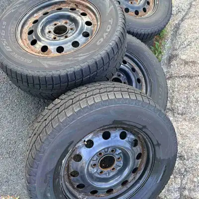 Four Toyo Observe GSi tires on rims. 275/65R18. 3 of the tires have low tread as seen in the pic. On...