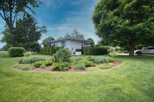 Open House! Sun. July 6th 12pm-2pm This beloved ranch home showcases pride of ownership, both inside...