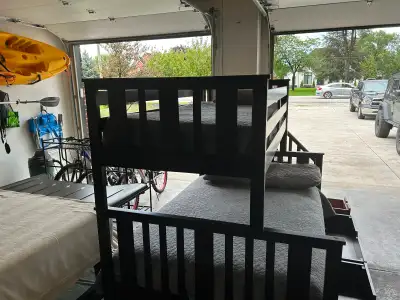 Wooden Bunkbed Sturdy stairs to top bunk Rolling drawers in stairs and under bed for storage. Good u...