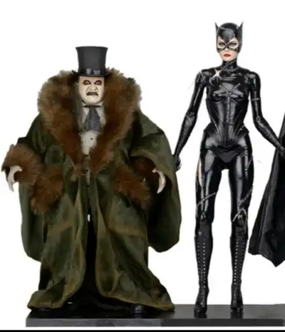 these are 1/4 scale or 18 inches. catwoman is 18 inches and penguin is about 15.5 inches (but much w...