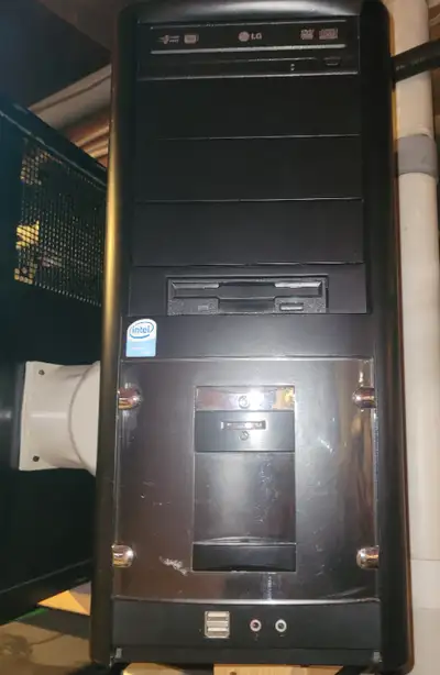 Intel Celeron D LG computer tower. Desktop computer. Location: Farm house basement west side on high...