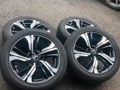 For sale is a set of four Honda wheels with tires, sized at 215 55R17, these are used, scratch less,...