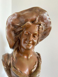 FRENCH ART NOUVEAU BRONZE BUST OF A YOUNG WOMAN,  EARLY XX C.