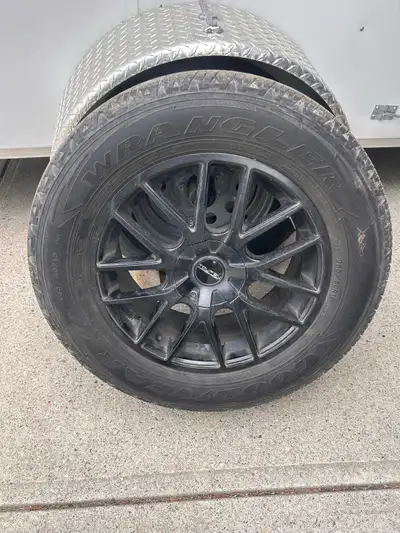 4 black 18 inch Touren aluminum rims on Goodyear wranglers Tires are older but good to get you by Ab...