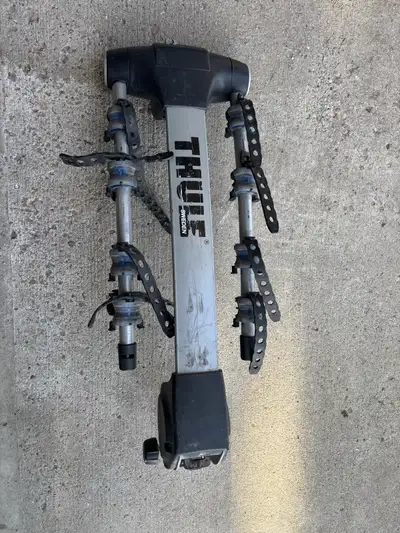 4 bike rack, locks onto vehicle at base, and cord locks bikes onto the rack so you can leave your bi...