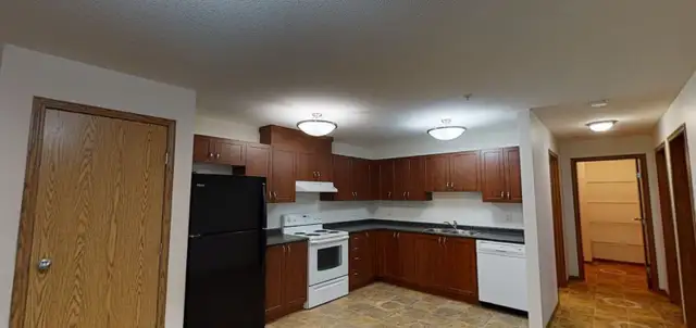 Roomate to share fully furnished two bedroom condo in Leduc.