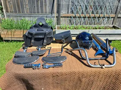 HD helmet 80 new bags 125 fishtail mufflers 60 floor boards 150 hyway pegs 50 bars 40. Saddle bag br...