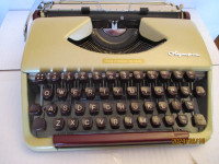 Vintage Beautiful Olympia portable Typewriter