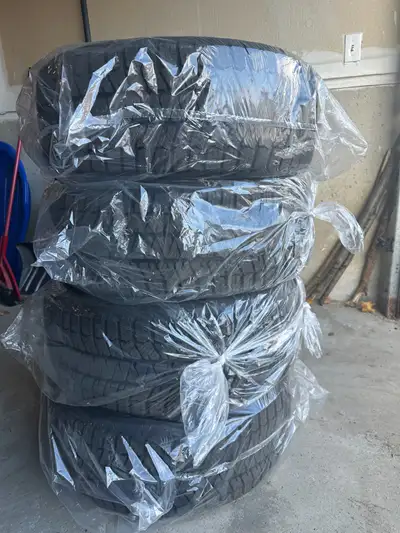 Used Bridgestone Blizzak 225 50 R18 winter tires in excellent condition. Lots of tread, 80% remainin...