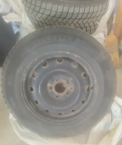Winter Tires and Rims For Sale. Michelin X-Ice. 215 65R16. Great shape. On Black steel rims. Bolt Pa...