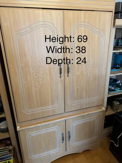 Great armoire for all kinds of storage. 2 pieces, beautiful details. Bottom part has shelves on both...