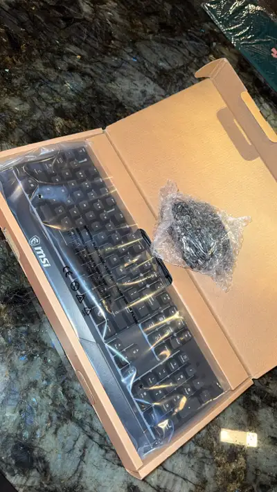 MSI Vigor GK30 gaming keyboard and Mouse. Both new and sealed. Came with my new computer but I’m cur...