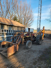 Tractor, international 350, loader, backhoe.