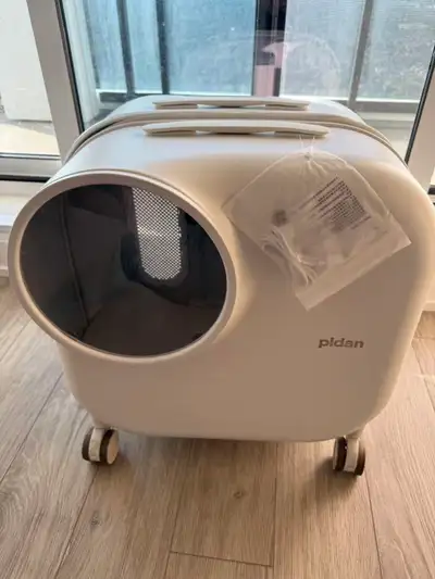     A brand-new rolling pet carrier, View more