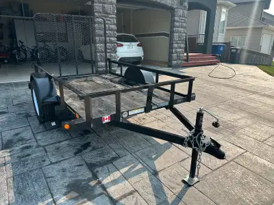 This utility trailer has dimensions of 5 X 8. All steel heavy duty trailer with 15” wheels. Rated up...