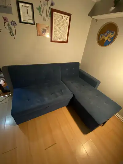 Big blue sofa bed couch with storage