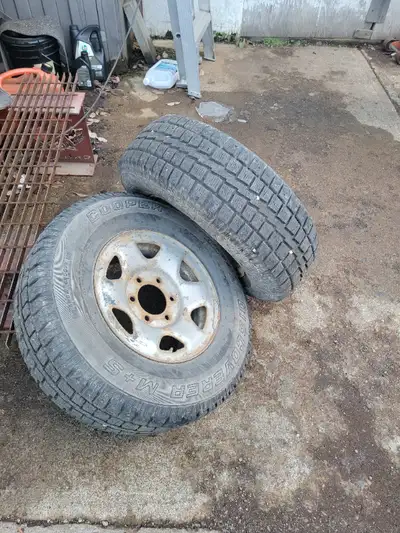 Came with a pickup and don't clear the brake calipers. Two like new cooper winters on nissan steel r...