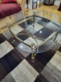 Free glass table with brass frame