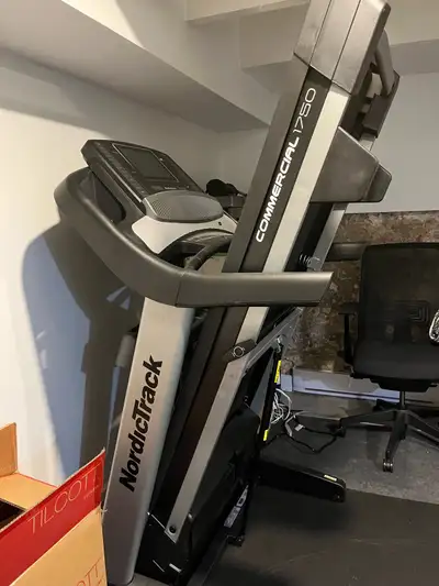 Barely used NordicTrack Commercial C1750 Treadmill. Folds up for storage. Originally paid approximat...