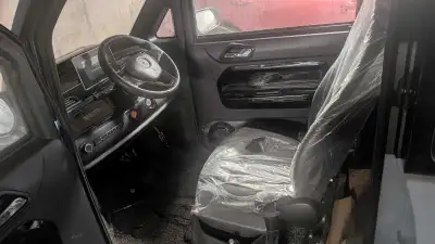 Electric Mimi car need a alignment done new tires body need to be done it's have power windows power...